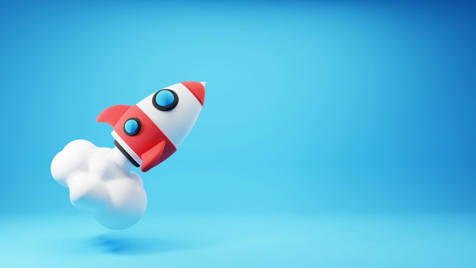 Foguete de brinquedo decolando em fundo azul